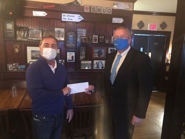 The Snug owner, Ed Brown, accepting PPP loan
